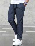 Manfinity Homme Herren einfarbige Hose mit Kordelzug in der Taille, Lässig